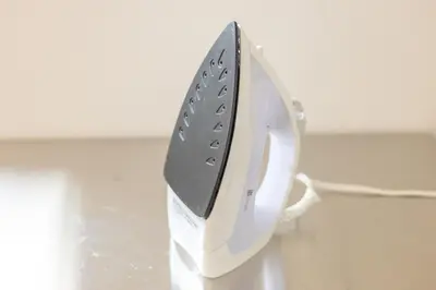 a white phone sitting on top of a table at The best Nakano house 4 minutes to station in Tokyo