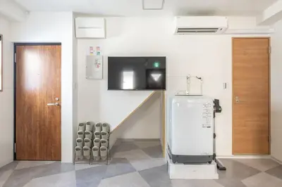 a room with a wall with a heater and a door at The best Nakano house 4 minutes to station in Tokyo