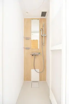 a bathroom with a shower with a mirror at The best Nakano house 4 minutes to station in Tokyo