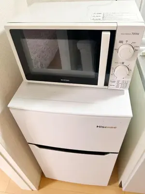 a microwave oven sitting on top of a white printer at \u6c60\u888b\u4e2d\u5fc3\u5730\u5e26! \u6c60\u888b\u8f66\u7ad9\u6b65\u884c6\u5206! \u516c\u5bd3\u5e72\u6e7f\u5206\u79bb!\u667a\u80fd\u9a6c\u6876! \u9ad8\u901f\u65e0\u9650\u5236\u7f51\u8def!Ikebukuro Center! Ikebukuro 6min walk!oioi201 in Tokyo