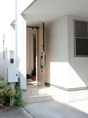 an open door of a house with a window at SunRise STAY Haruna in Tokyo