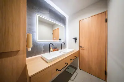 a bathroom with a sink and a mirror at MARUMI HOTEL Uguisudani\u9daf\u8c37 in Tokyo