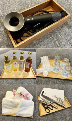 a wooden box with a wine bottle and a pair of scissors at Rakuyu asakusa in Tokyo