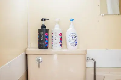 three bottles ofodorizers sitting on top of a toilet at 603 8 min walk to Ikebukuro 6 min walk to Kanamecho Station25m Max 2 people Direct access to Tokyo, Shinjuku, Shibuya, Ueno in Tokyo