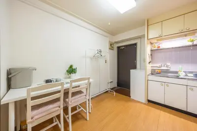 a kitchen with a sink and a refrigerator at 603 8 min walk to Ikebukuro 6 min walk to Kanamecho Station25m Max 2 people Direct access to Tokyo, Shinjuku, Shibuya, Ueno in Tokyo