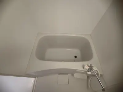 a bathroom with a white sink in a room at 302Room,7-minute walk from Uguisudani Station located on the 3nd floor of an apartment-style building Twin room No elevator in Tokyo