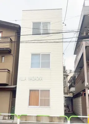 a white building with the words la vaza written on it at Tokyo Kita-ku B&B, 202, convenient transportation to four stations, 3 km from Chinatown Ikebukuro in Tokyo