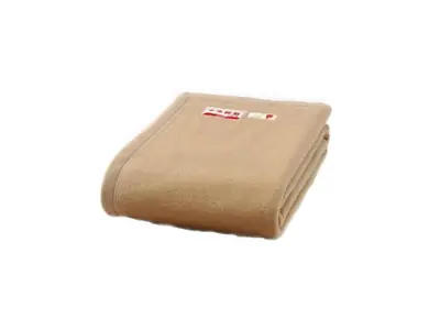 a brown pillow with the american flag on it at Smile Hotel Tokyo Ayase Ekimae - Vacation STAY 14744v in Tokyo