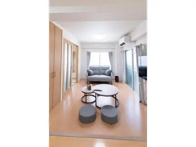 a living room with a table and a couch at VOERE KAMEIDO - Vacation STAY 48842v in Tokyo
