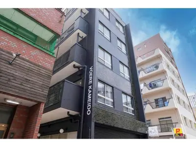 a building with a sign on the side of it at VOERE KAMEIDO - Vacation STAY 48842v in Tokyo