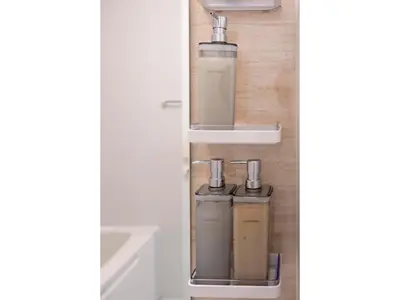 a door with two water bottles on a wall at VOERE KAMEIDO - Vacation STAY 48878v in Tokyo