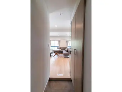 a hallway leading to a living room with a table at VOERE KAMEIDO - Vacation STAY 48034v in Tokyo