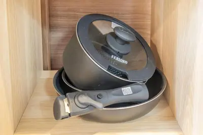 a metal container with a utensil in a wooden box at Wooden warmth of a house 8 people Skytree 7 minutes 75 square meters Asakusa, Shibuya, Narita, Haneda direct in Tokyo