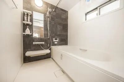a bathroom with a tub and a sink and a shower at Wooden warmth of a house 8 people Skytree 7 minutes 75 square meters Asakusa, Shibuya, Narita, Haneda direct in Tokyo