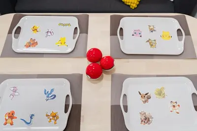a table with three plates and balls on it at AT Akihabara No3 in Tokyo