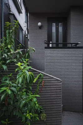 a house with a staircase leading to a balcony at Shibuya Area, 5-min to Shinjuku, 7-min to Sta, 4BR in Tokyo