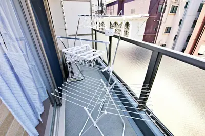 a view of a balcony with a table at Gaia Shinjuku 503 in Tokyo