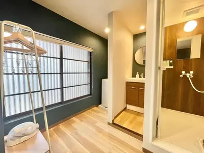 a bathroom with a shower and a sink at Hotel Kototoi Juku HAKU in Tokyo