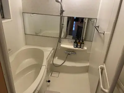 a bathroom with a tub and a sink and a shower at Rakuna Inn Nizi - Oshiage 2 - Vacation STAY 46832v in Tokyo