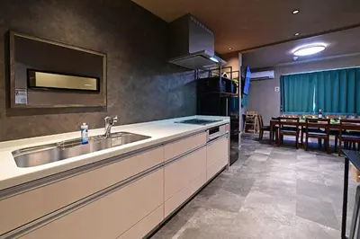 a kitchen with a sink and a dining room at Rakuna Inn Nizi - Oshiage 2 - Vacation STAY 46832v in Tokyo