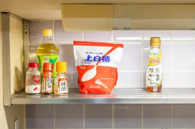 a shelf in a refrigerator filled with condiments at Ikebukuro 8 min walk, Kanamecho 6 min walk, 25sqm room, 2 guests, Direct access to Shinjuku, Shibuya, Tokyo, Ueno, 2 single beds in Tokyo