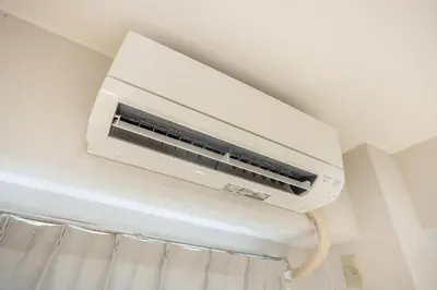 a air conditioner on the ceiling of a room at Ikebukuro 8 min walk, Kanamecho 6 min walk, 25sqm room, 2 guests, Direct access to Shinjuku, Shibuya, Tokyo, Ueno, 3 single beds in Tokyo
