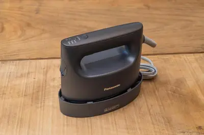 a black iron sitting on top of a wooden floor at \u30b7\u30ce\u30f3\u8535\u524d CINON Kuramae in Tokyo