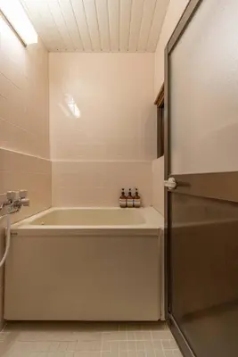 a bathroom with a bath tub and a shower stall at Aimer202 AI22 in Tokyo