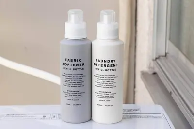two bottles of laundry detergent sitting on a window sill at Aimer202 AI22 in Tokyo