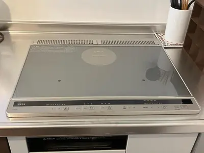 a laptop computer sitting on top of a counter at Tokyo Stay Aoto in Tokyo