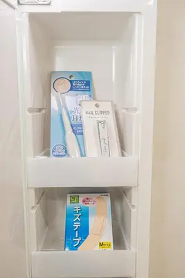 a refrigerator filled with milk and toothbrushes at Koiwa Station Entire Villa Two Generation House with 1BR Cozy Apartment and 4BR Spacious Home Easy JR Access to Asakusa Skytree Shinjuku Shibuya Ueno and Narita Haneda Airport in Tokyo