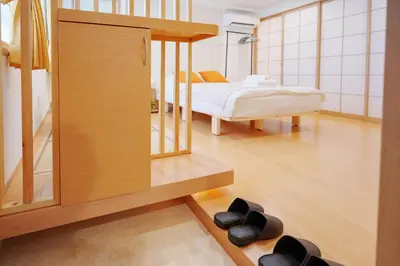a bedroom with a bed and a room with a mirror at YYT New listing, 30 seconds walk from the subway, high-speed Wi-Fi, complete facilities, convenient surroundings, high cost performance in Tokyo