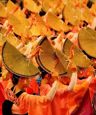 a group of people in orange uniforms holding umbrellas at PR54 Winter Tokyo Shinjuku Xmas Lights New Year Shrine in Tokyo