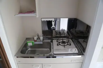 a kitchen with a stove and a sink at PR54 Winter Tokyo Shinjuku Xmas Lights New Year Shrine in Tokyo
