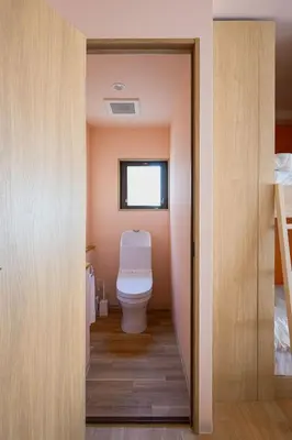 a bathroom with a toilet in a small room at 4K Cinema Duplex, 8 Guests, 4 min in Tokyo