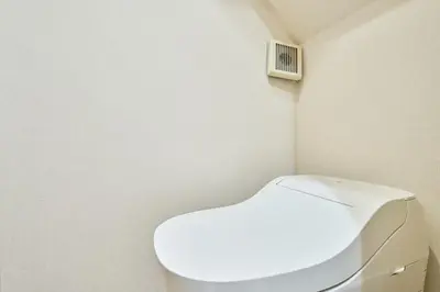 a bathroom with a white toilet in a room at STAY ARI Higashishinjuku in Tokyo