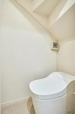 a bathroom with a white toilet in a attic at STAY ARI Higashishinjuku in Tokyo