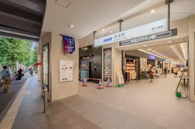 a shopping mall with people walking inside of it at T-Flat SASAZUKA in Tokyo