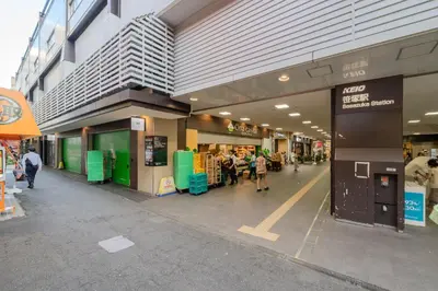 a shopping mall with people walking inside of it at T-Flat SASAZUKA in Tokyo