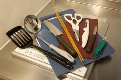 a blue tray with utensils on a table at Kokoon Hotel Ebisu in Tokyo