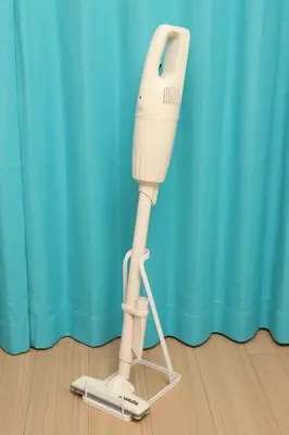 a hair dryer on a stand in front of a curtain at \u5800\u52074\u4e01\u76ee\u6238\u5efa in Tokyo