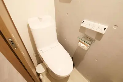 a bathroom with a white toilet in a room at Heureux\u690e\u540d\u753a202 in Tokyo