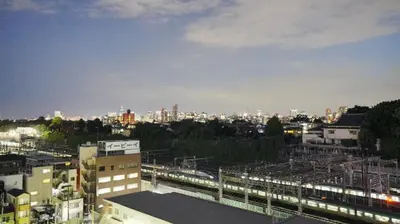 a view of a city with a train at LIO HOTEL Tokyo Nippori in Tokyo