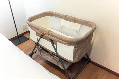 a basket sitting next to a wall next to a bed at Starry Stay House Shibuya I in Tokyo