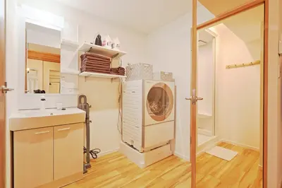 a bathroom with a washing machine and a sink at V Close to Shinjuku Kabukicho Korean Town FrWIFI N in Tokyo