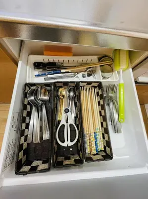 a drawer filled with utensils in a refrigerator at \u9280\u5ddd\u306e\u5bbf in Tokyo