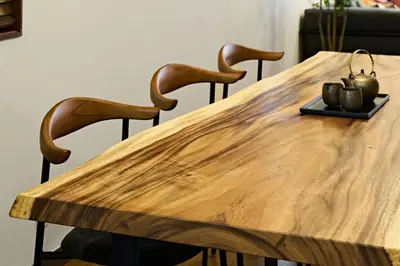 a wooden table with two chairs and a bowl on it at \u3077\u3075\u304b\u548c\u83dc\u9418\u30f6\u6df5 in Tokyo