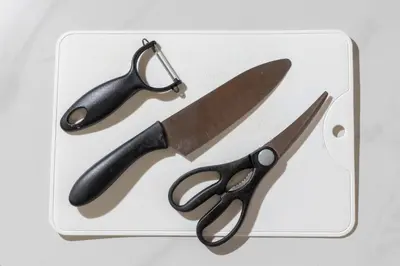 a pair of scissors and a knife in a box at Spacious Private Hotel Floor for up to 16 Guests about 10 minute walk from JR Ryogoku Station HOTEL Musashi Tokyo Ryogoku in Tokyo