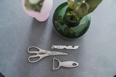 a pair of scissors on a table next to a vase at 2 min by train to Shibuya New 3rd floor 19 square meters in Tokyo