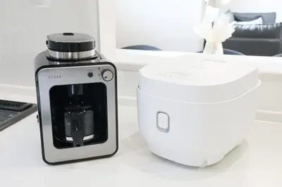 a coffee maker sitting on a white counter next to at Skytree Neighbors close to Asakusa & Tokyo Skytree in Tokyo